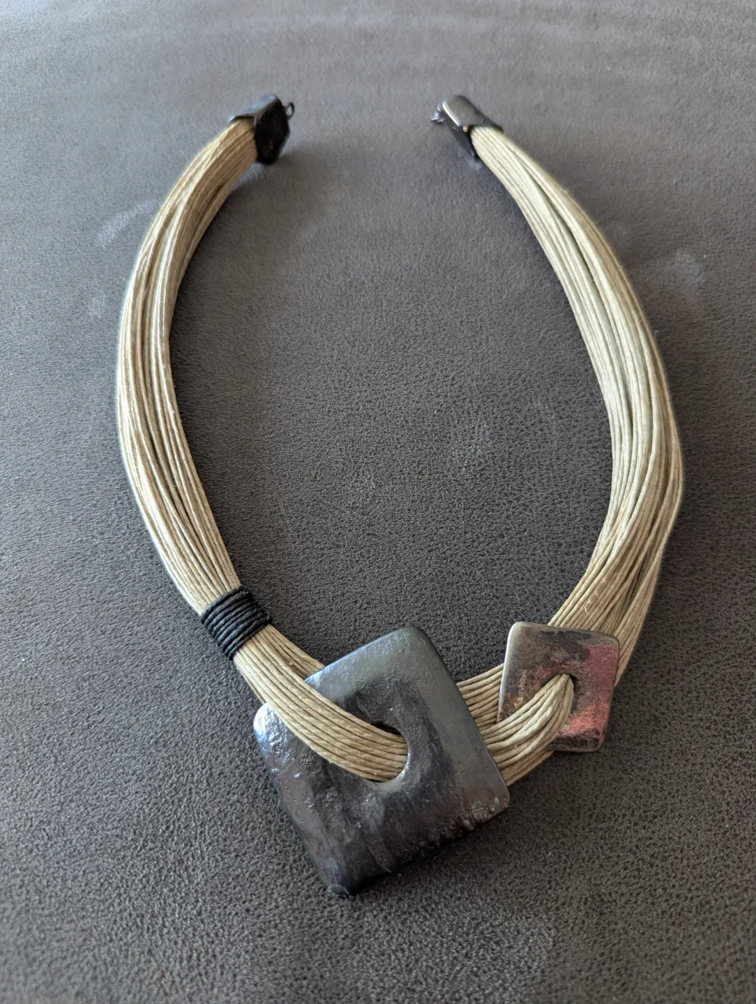 Unique woven necklace with metallic accents thumbnail