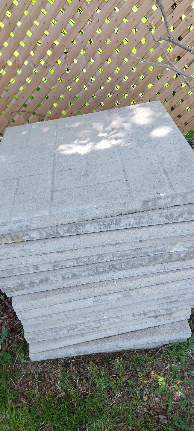 18  24"× 24" Stack of Concrete Paving Stones