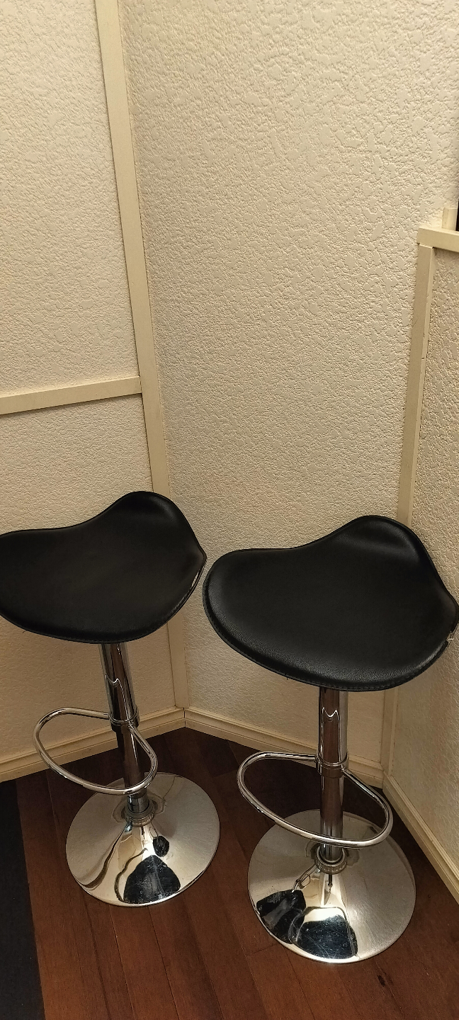 Pair of Black and Chrome Adjustable Bar Stools