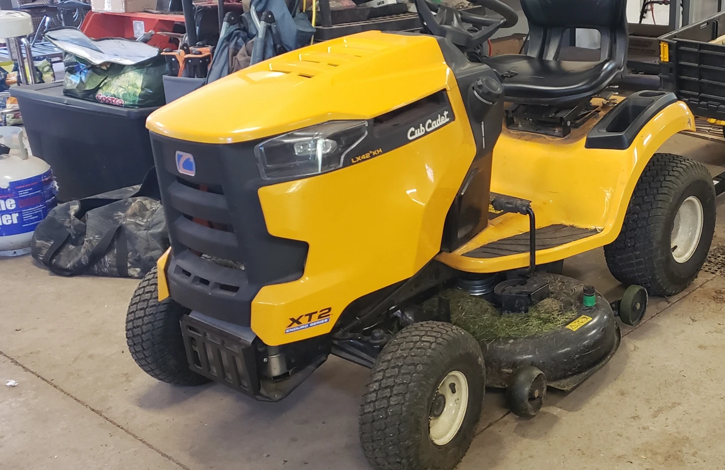 Cub Cadet LX426KH riding lawn tractor with trailer