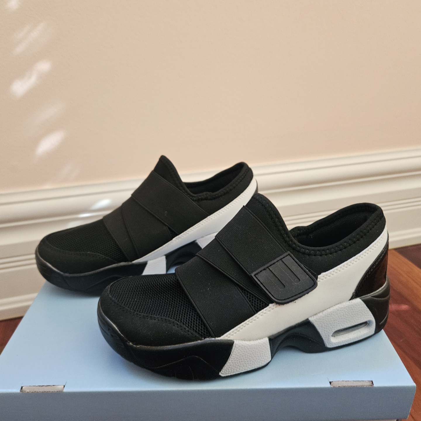 Women's Black and White Slip-On Sneakers