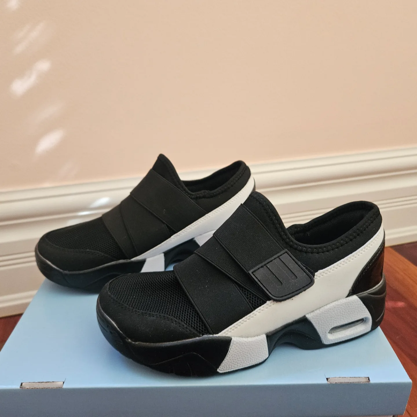 Women's Black and White Slip-On Sneakers thumbnail