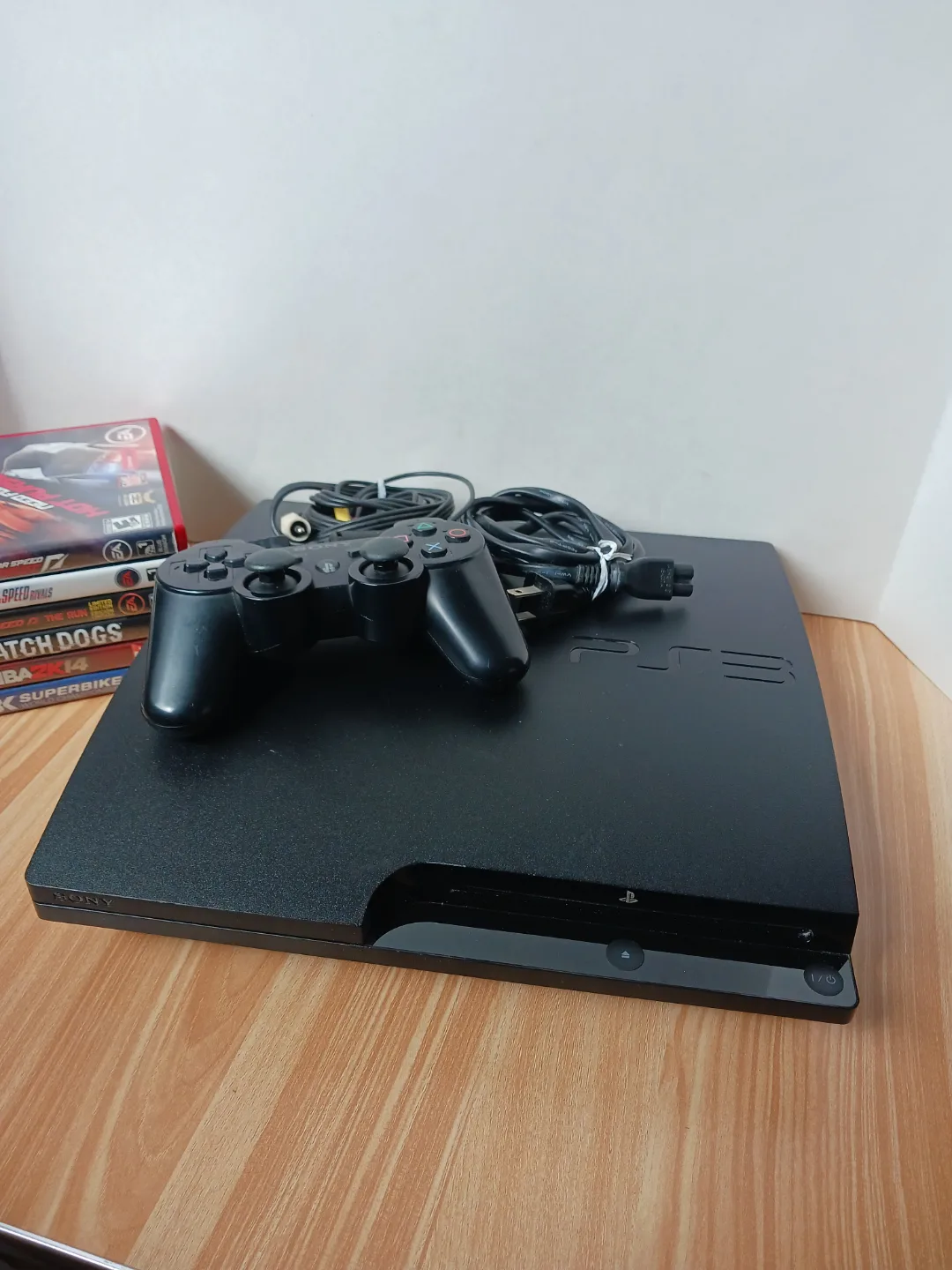 PS3 Slim Console with Controller and  6 Games image indicator(2)