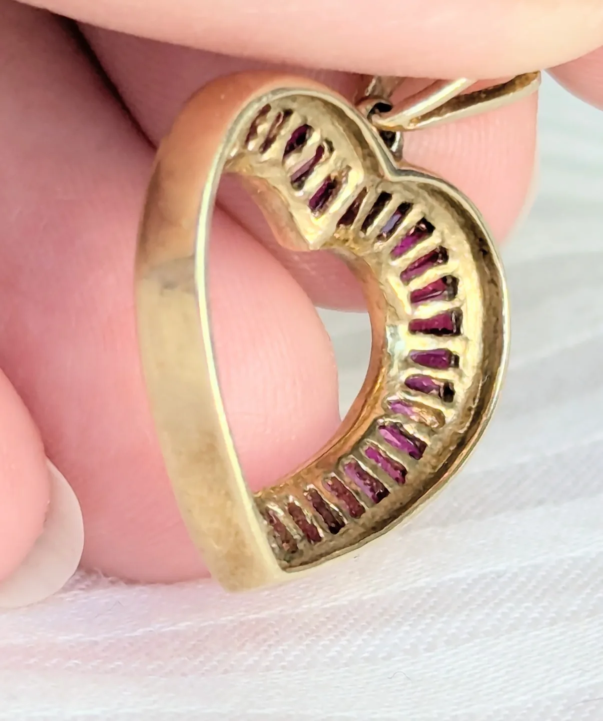 Gold Heart Pendant with baguette-cut rubies image indicator(3)