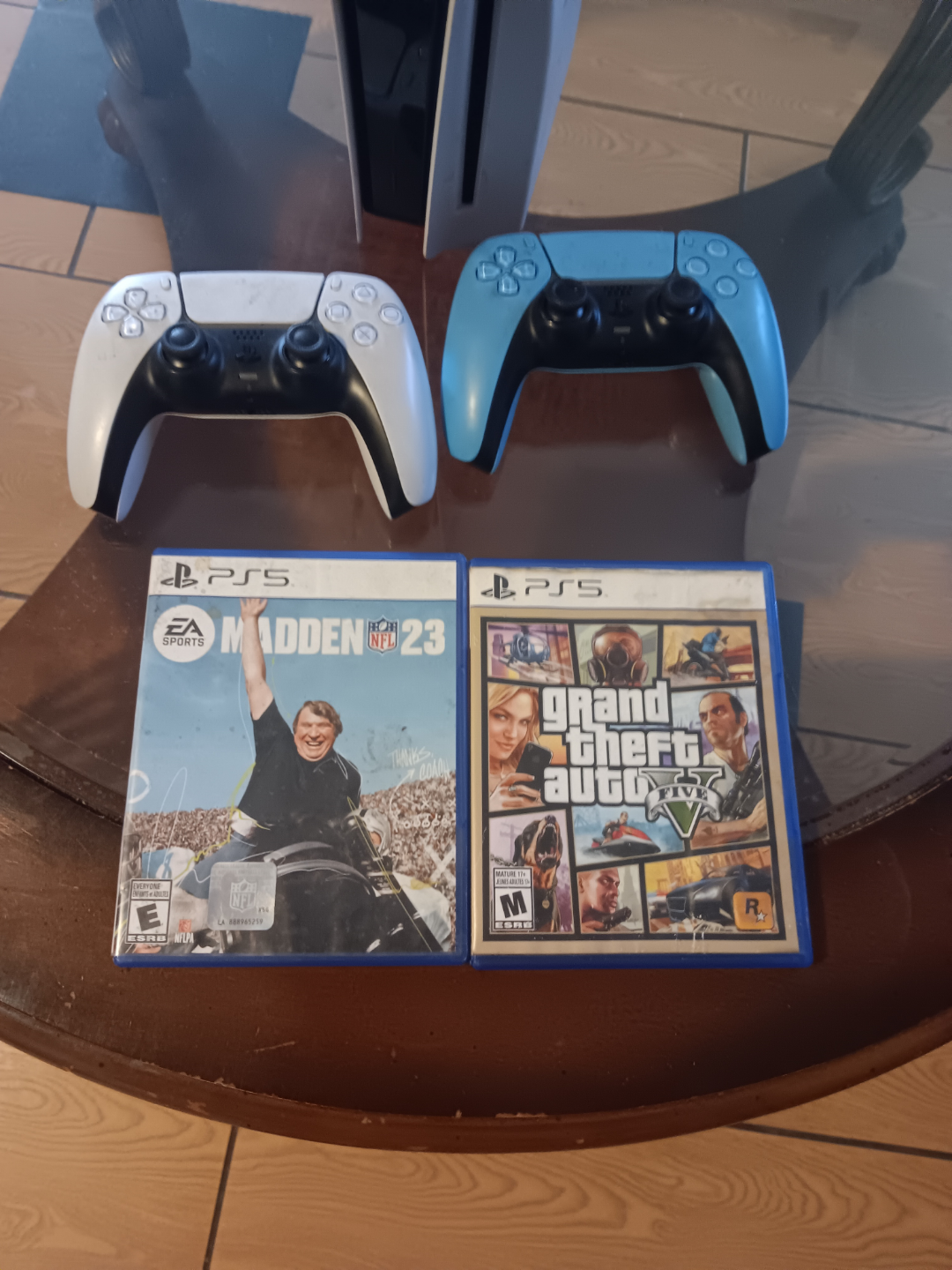 PS5 Console with Two Controllers and Games