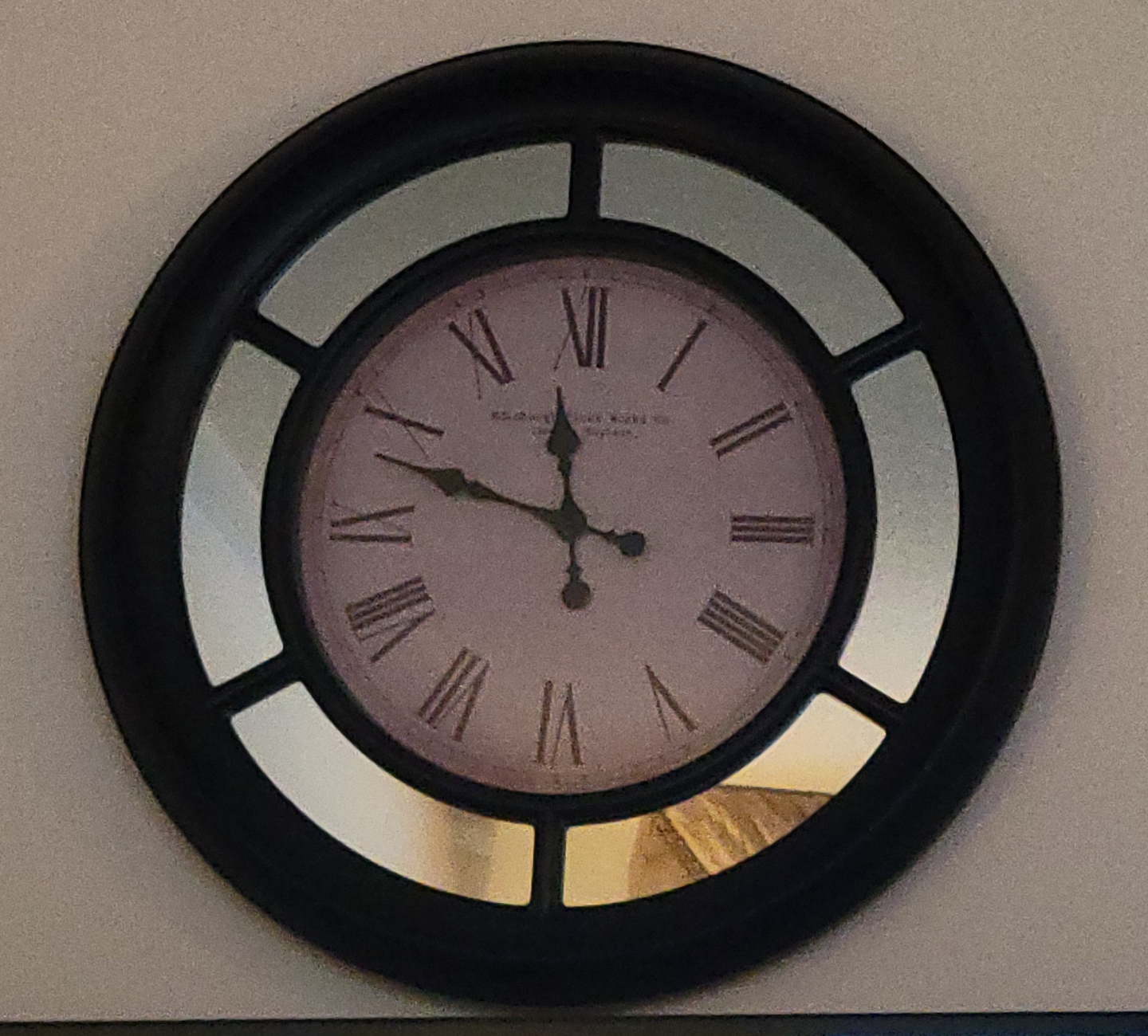 Large Black Framed Wall Clock with Mirrored Accents