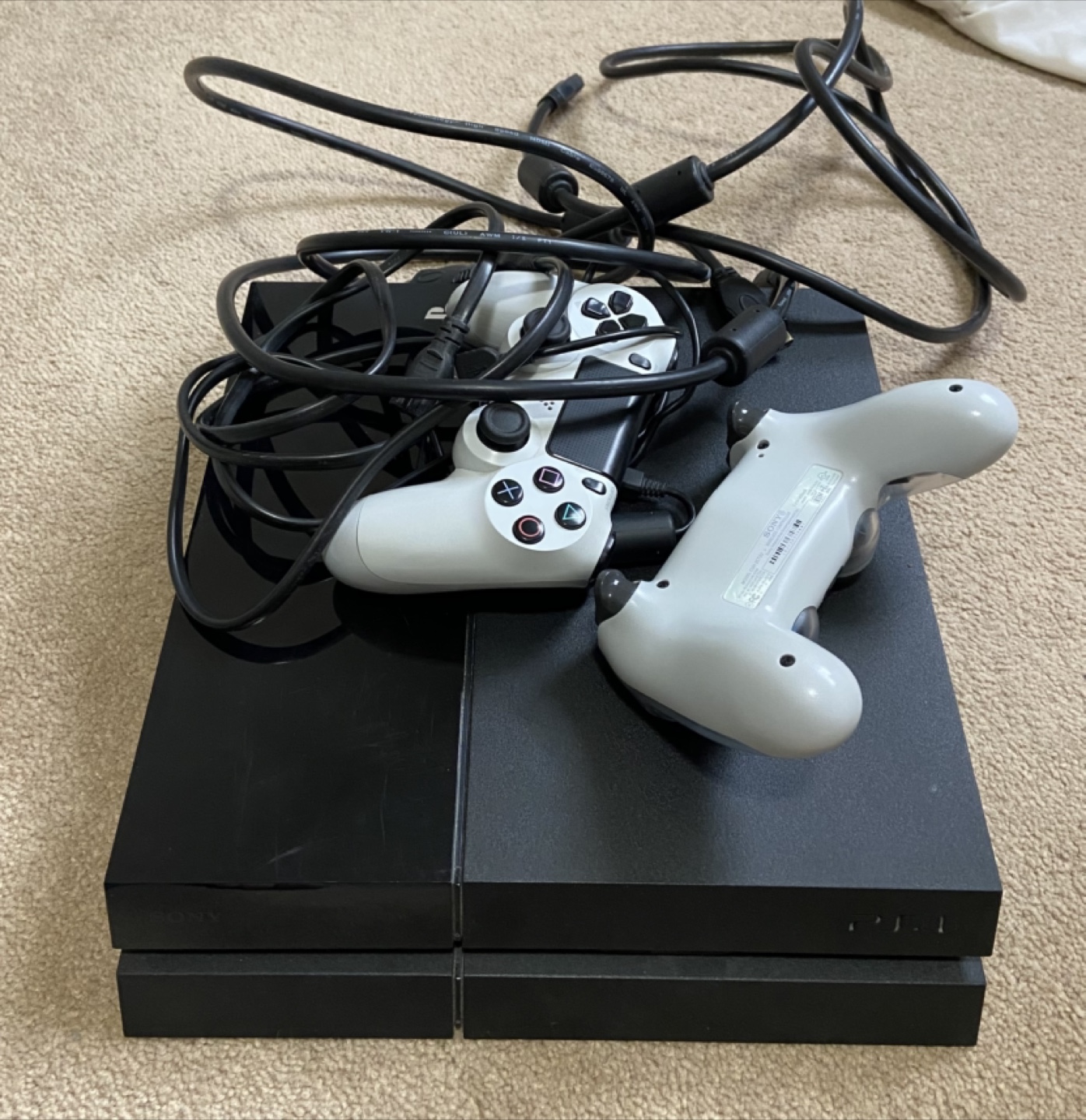 Sony PlayStation 4 Slim Console with Two Controllers