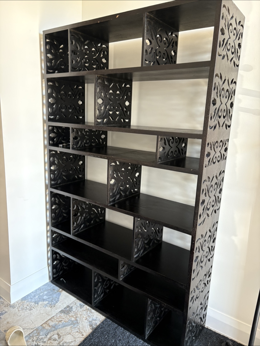 Large Black carved asymmetrical bookshelf