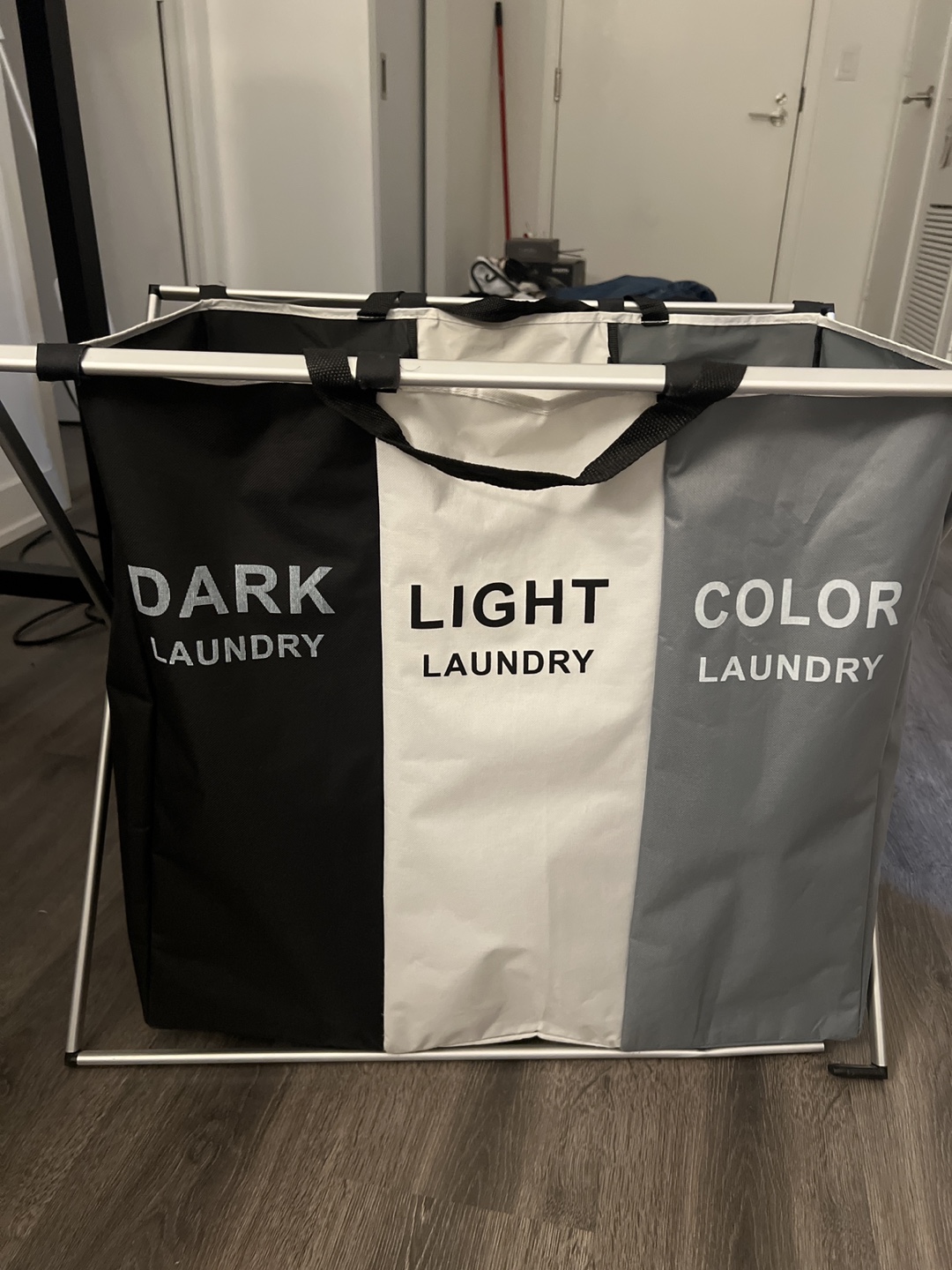 Three-compartment laundry basket
