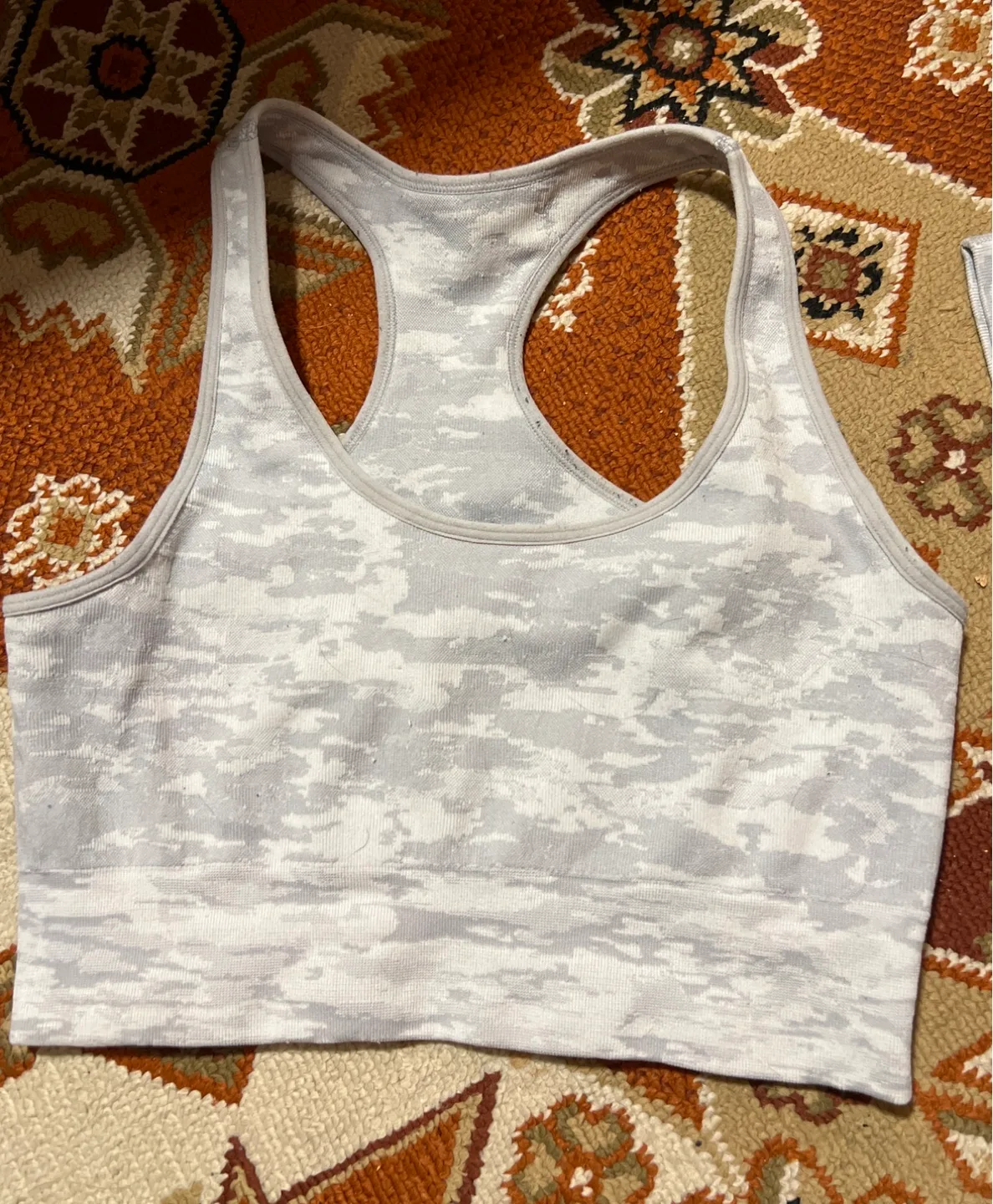 4 pairs of leggings and a sports bra image indicator(3)