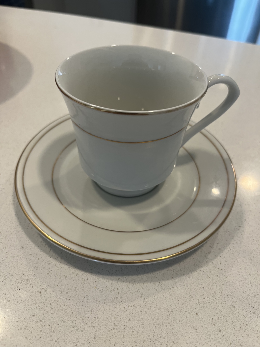 Set of 11 Teacups and Saucers