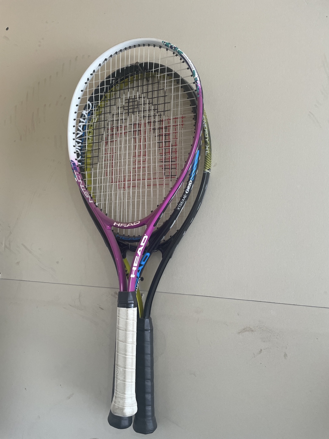 Three Head Tennis Racquets and Three Tennis Balls