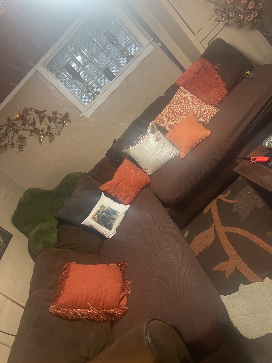 Brown Sectional Sofa with Throw Pillows