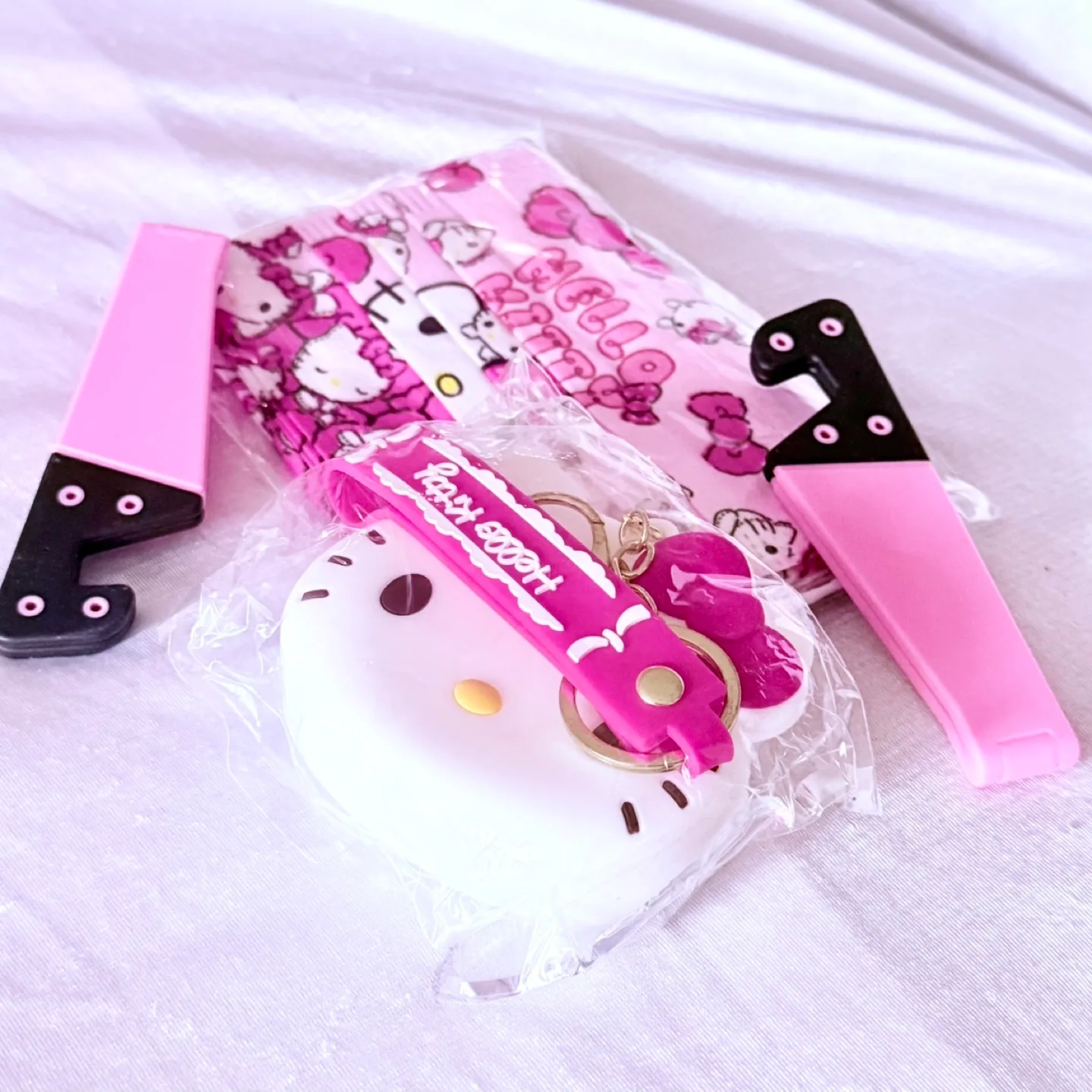Hello Kitty stuff (masks, coin purse) thumbnail