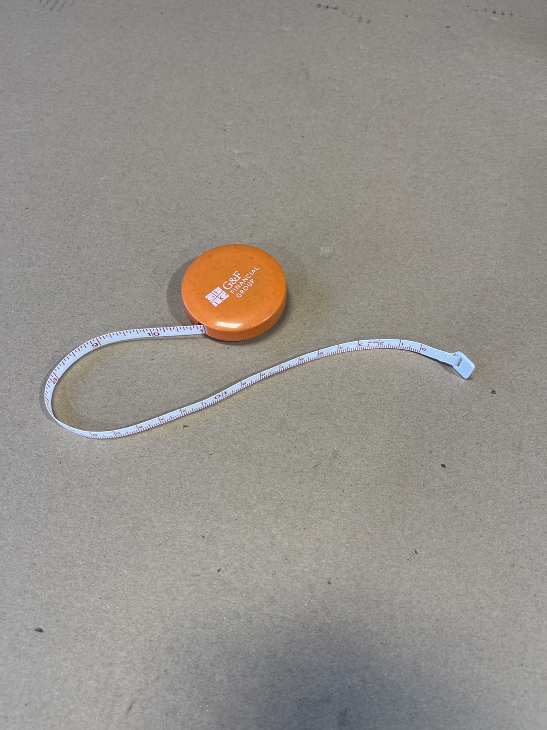 Orange Pocket Tape Measure - C&R Financial Group