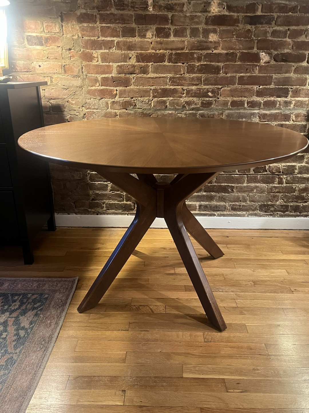 Round wood dining table mid-century modern style