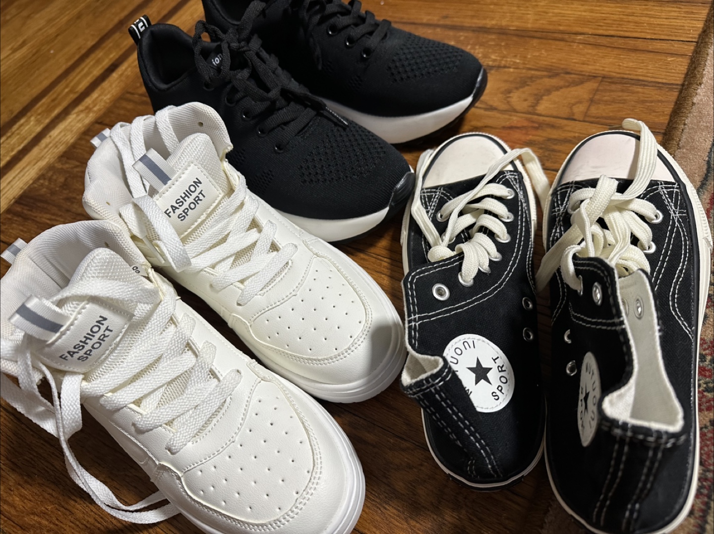 Three pairs of shoes -White, Black Sneakers