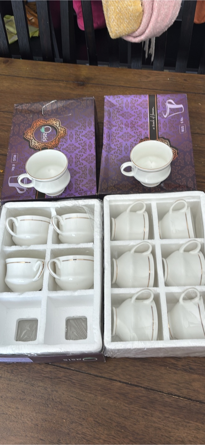 Two sets of Oasis Fine China teacups