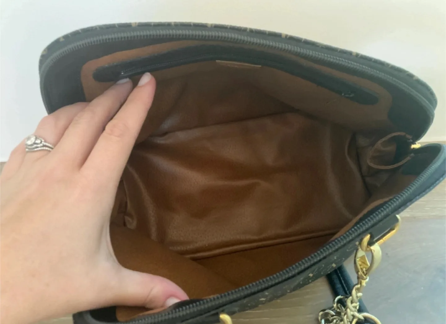 Authentic Valentino Garavani Black and Gold Handbag image indicator(4)