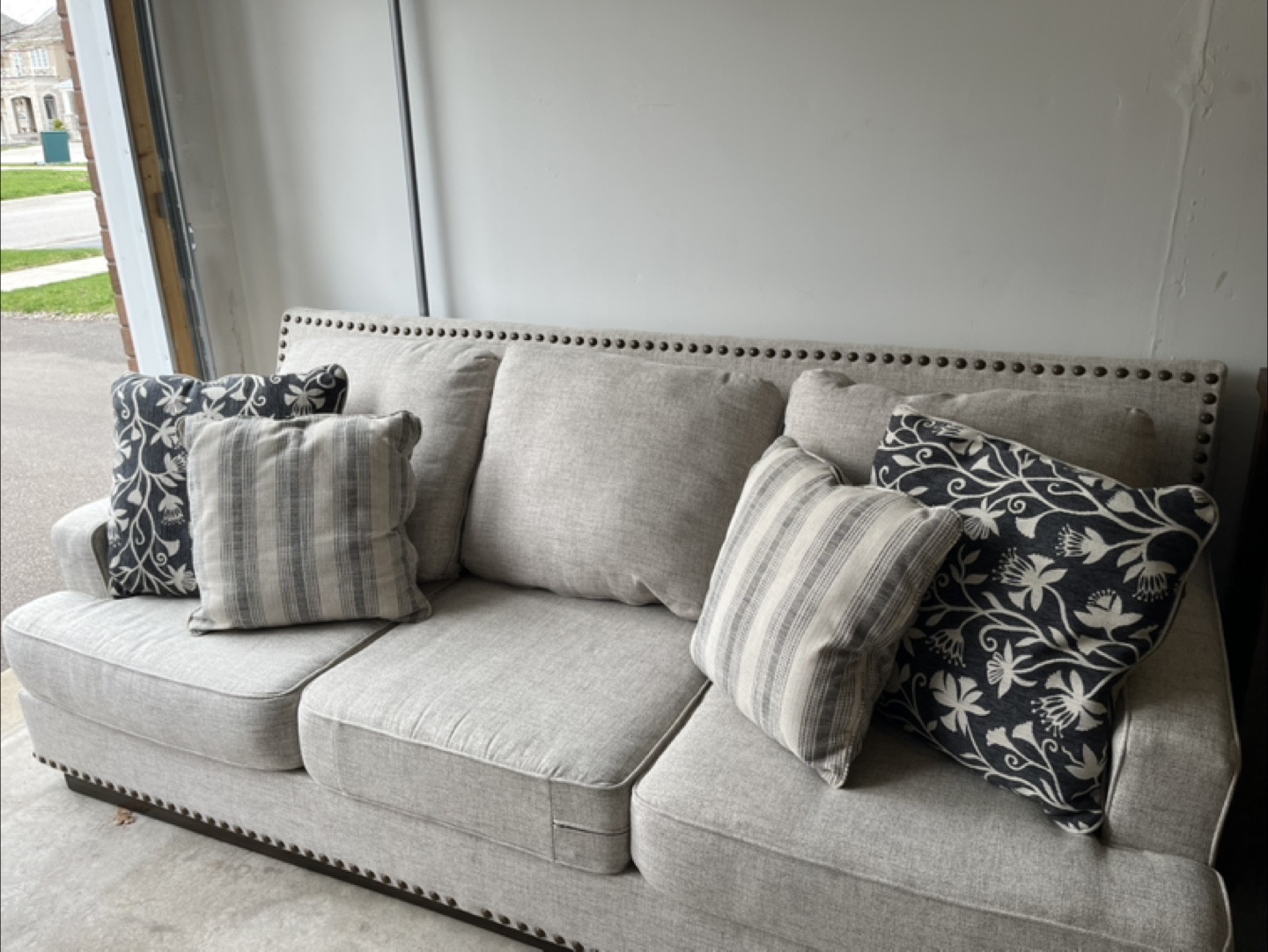 Ashley Light Grey Fabric Sofa with Nailhead Trim