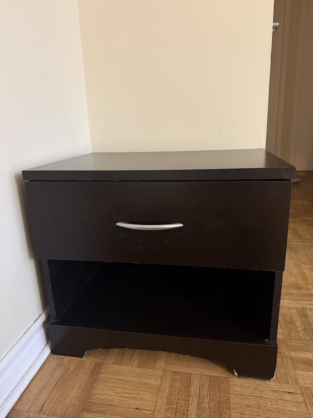 Dark brown nightstand with one drawer