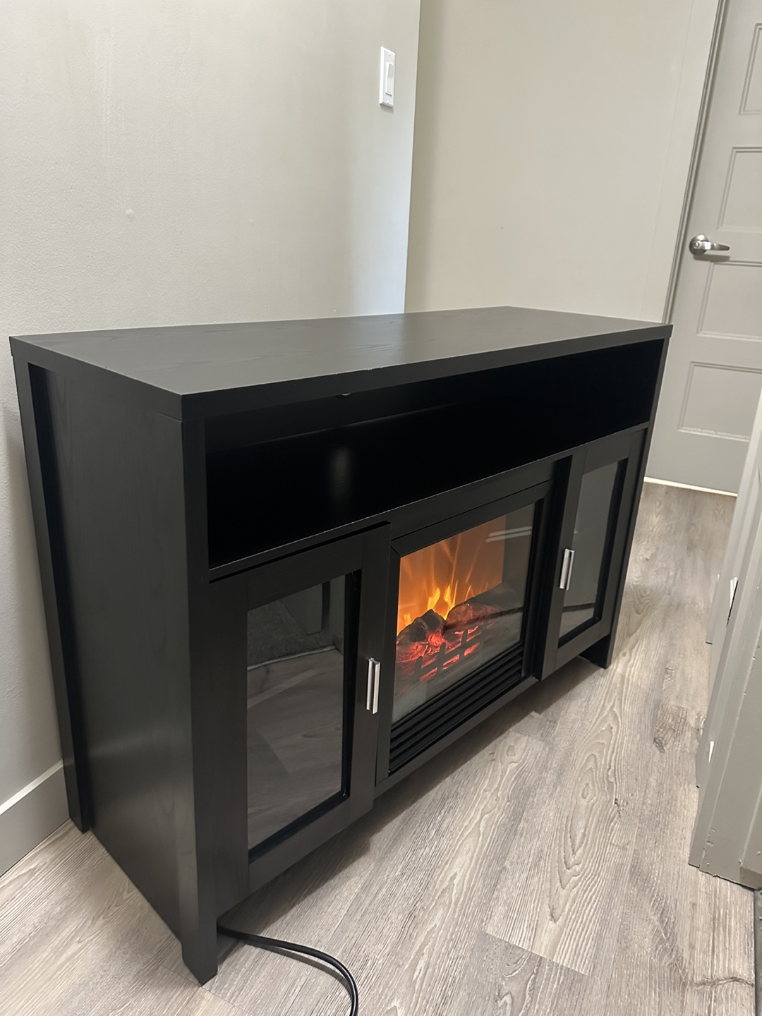 Fireplace TV stand in outstanding condition.