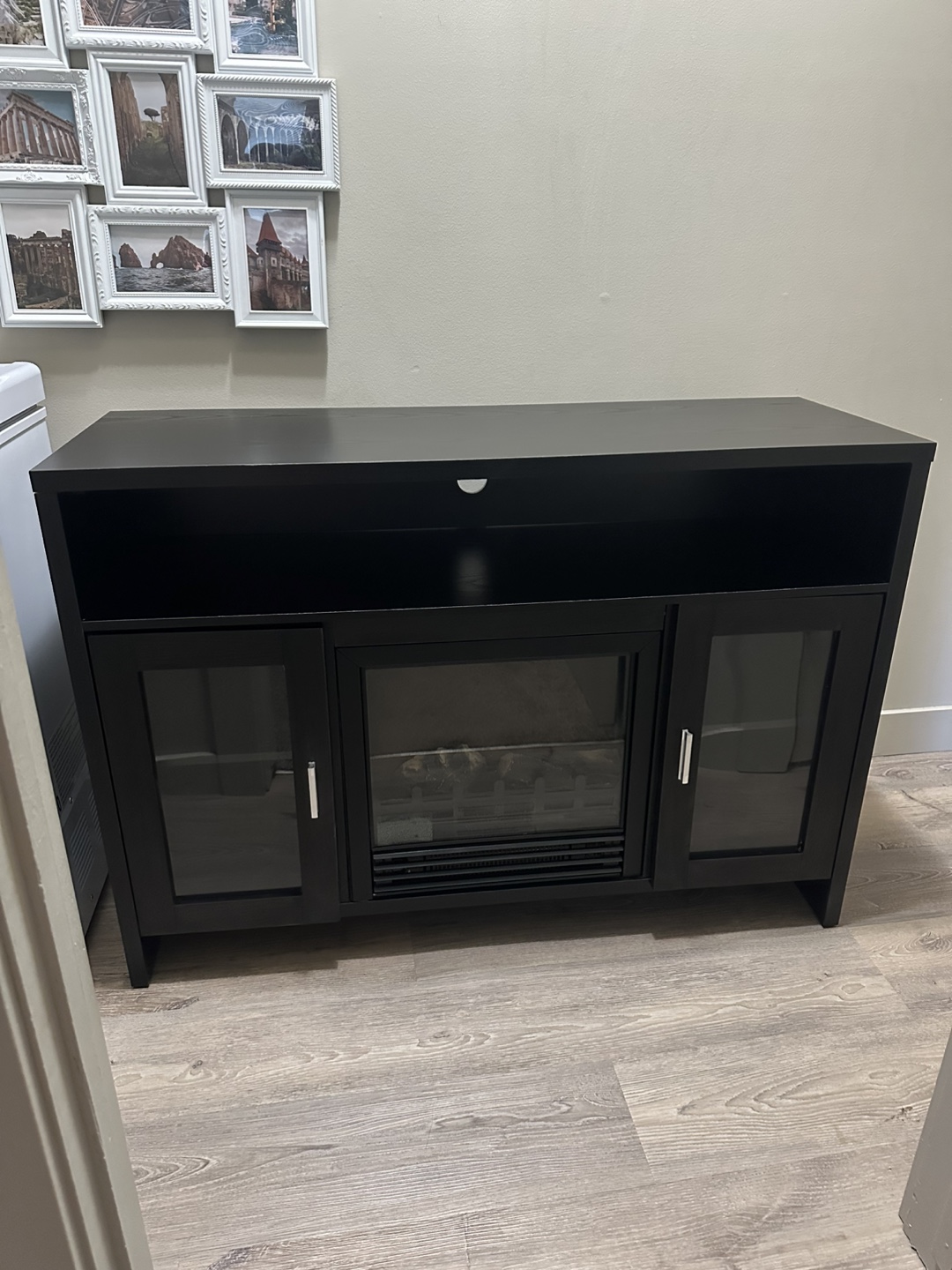 Fireplace TV stand in outstanding condition. - photo 5