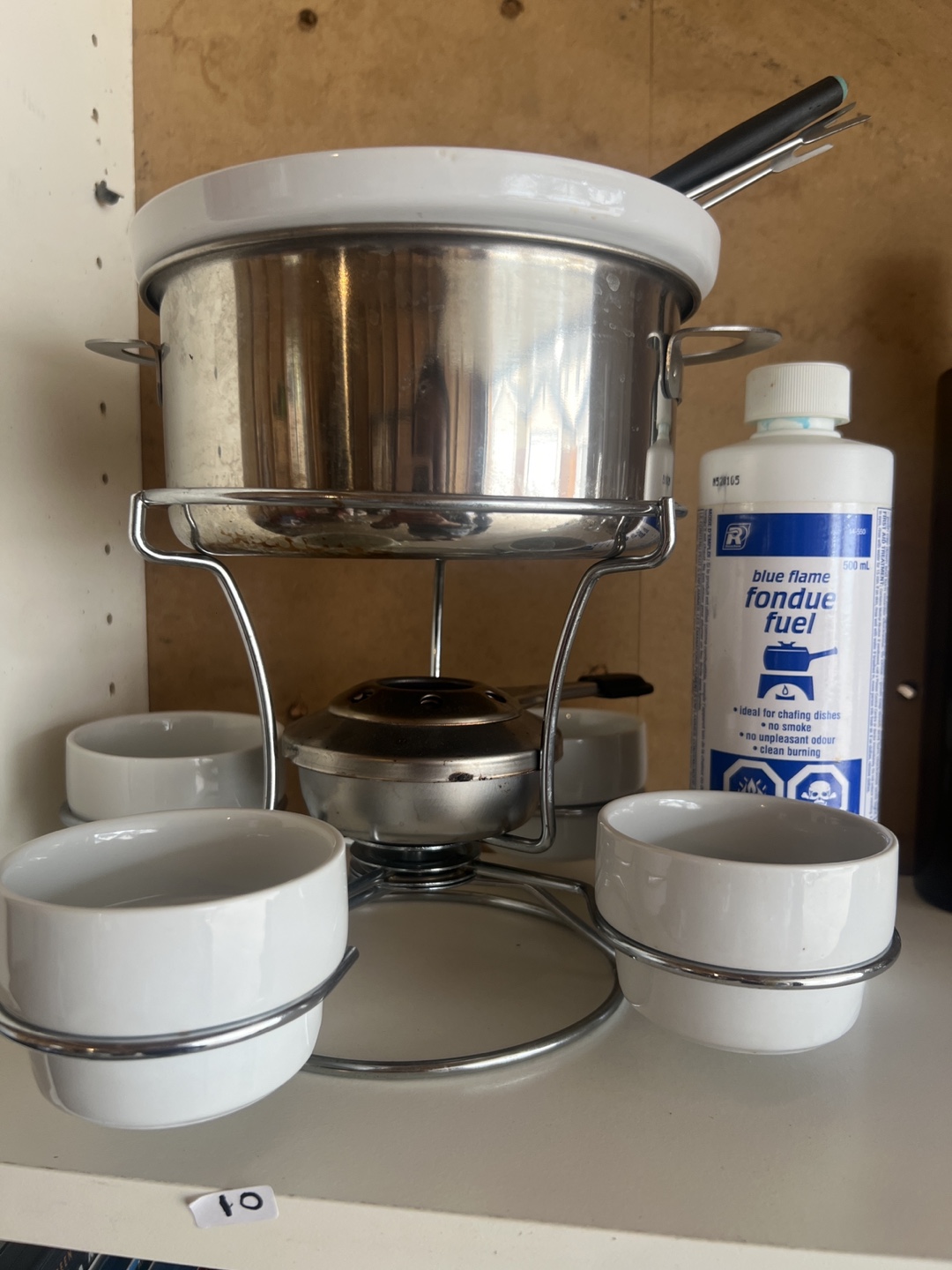 Vintage fondue set with four ramekins