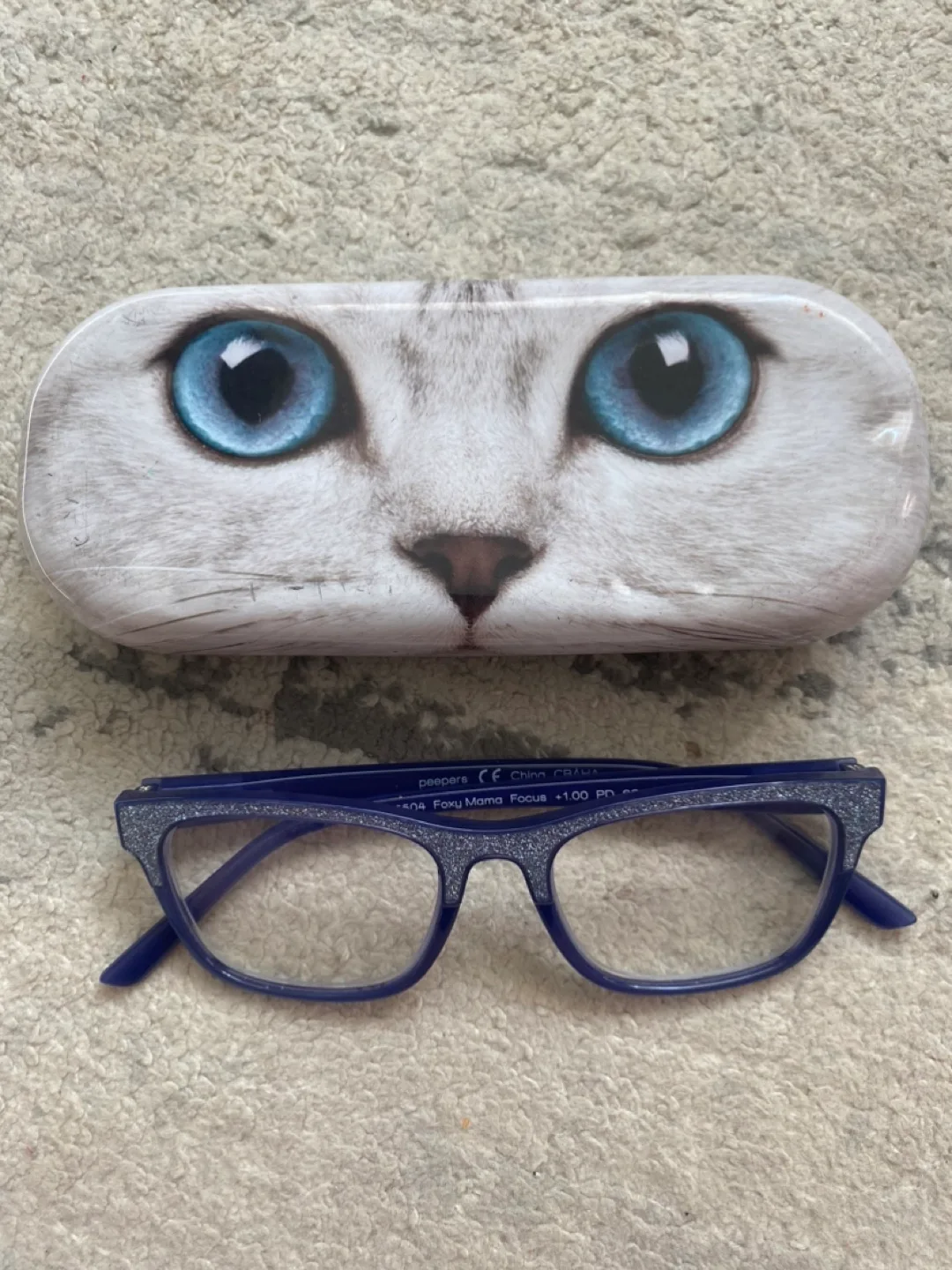 Cat eyes glass case and sparkly blue +1 reading glasses thumbnail