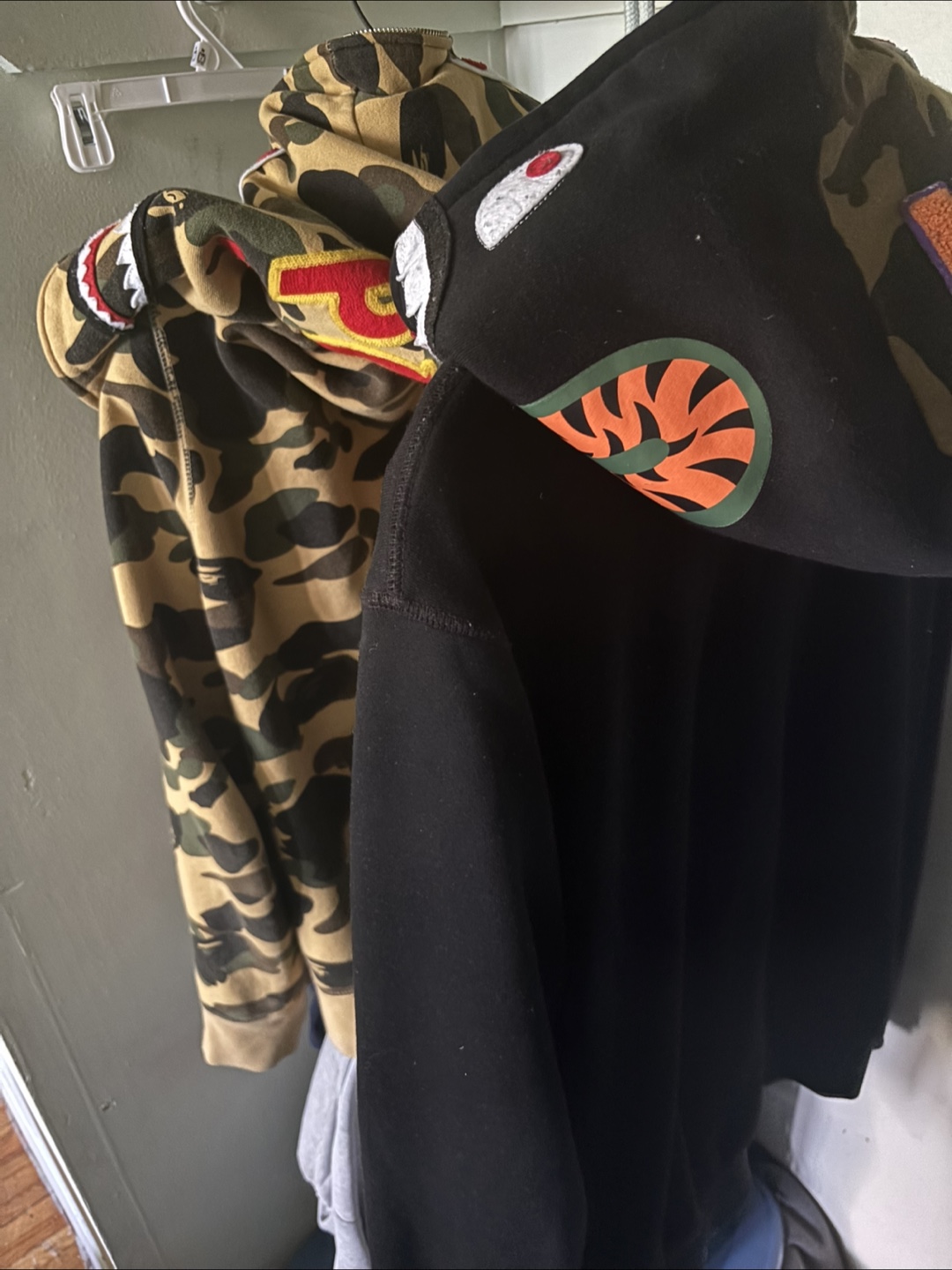 A Bathing Ape Camo and Black Hoodies