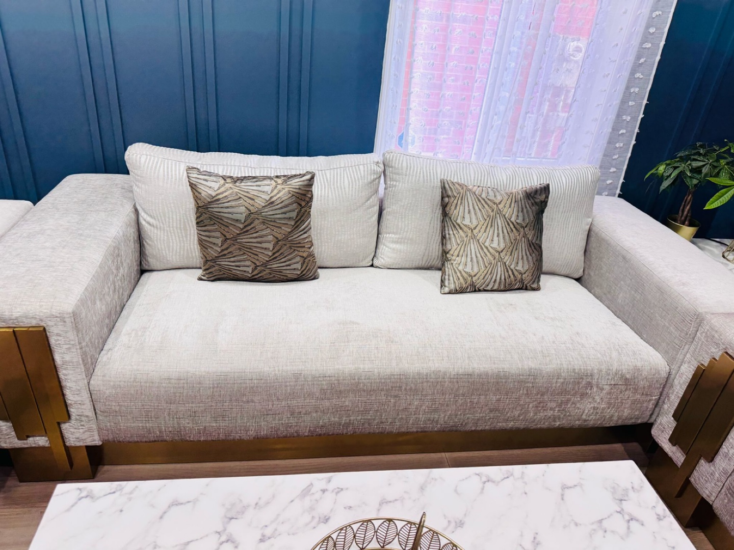 Elegant Grey Sofa with Gold Accents - photo 3