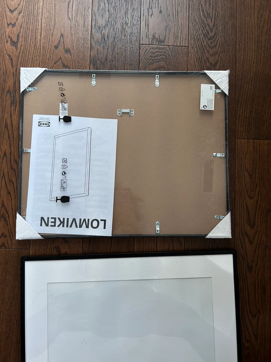 2 black IKEA Lomviken picture frames image indicator(3)