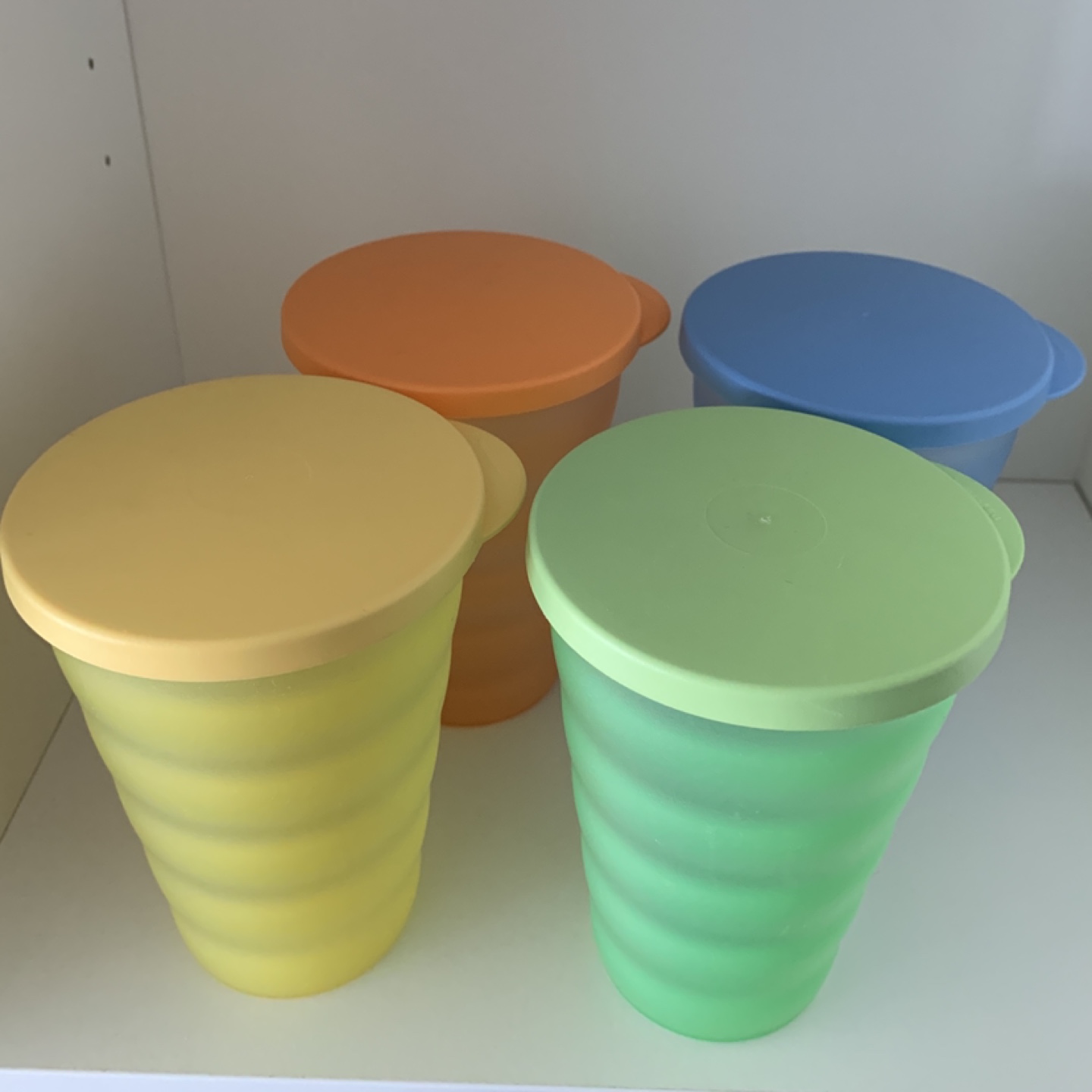Tupperware Stackable Cups with Lids - Set of Four