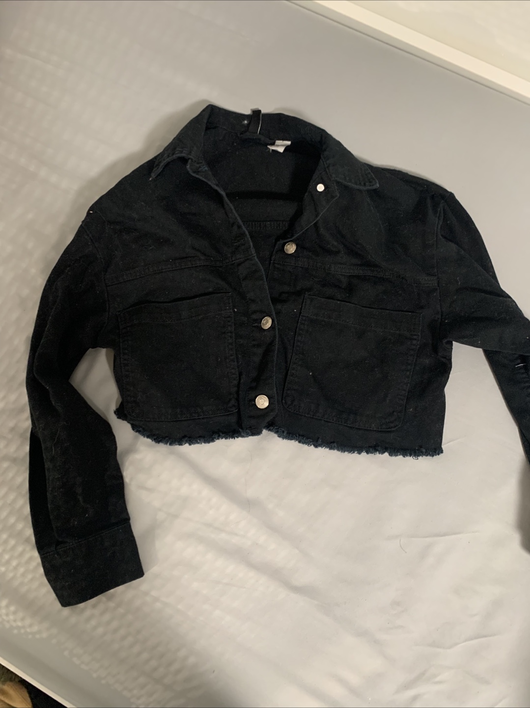Black cropped denim jacket