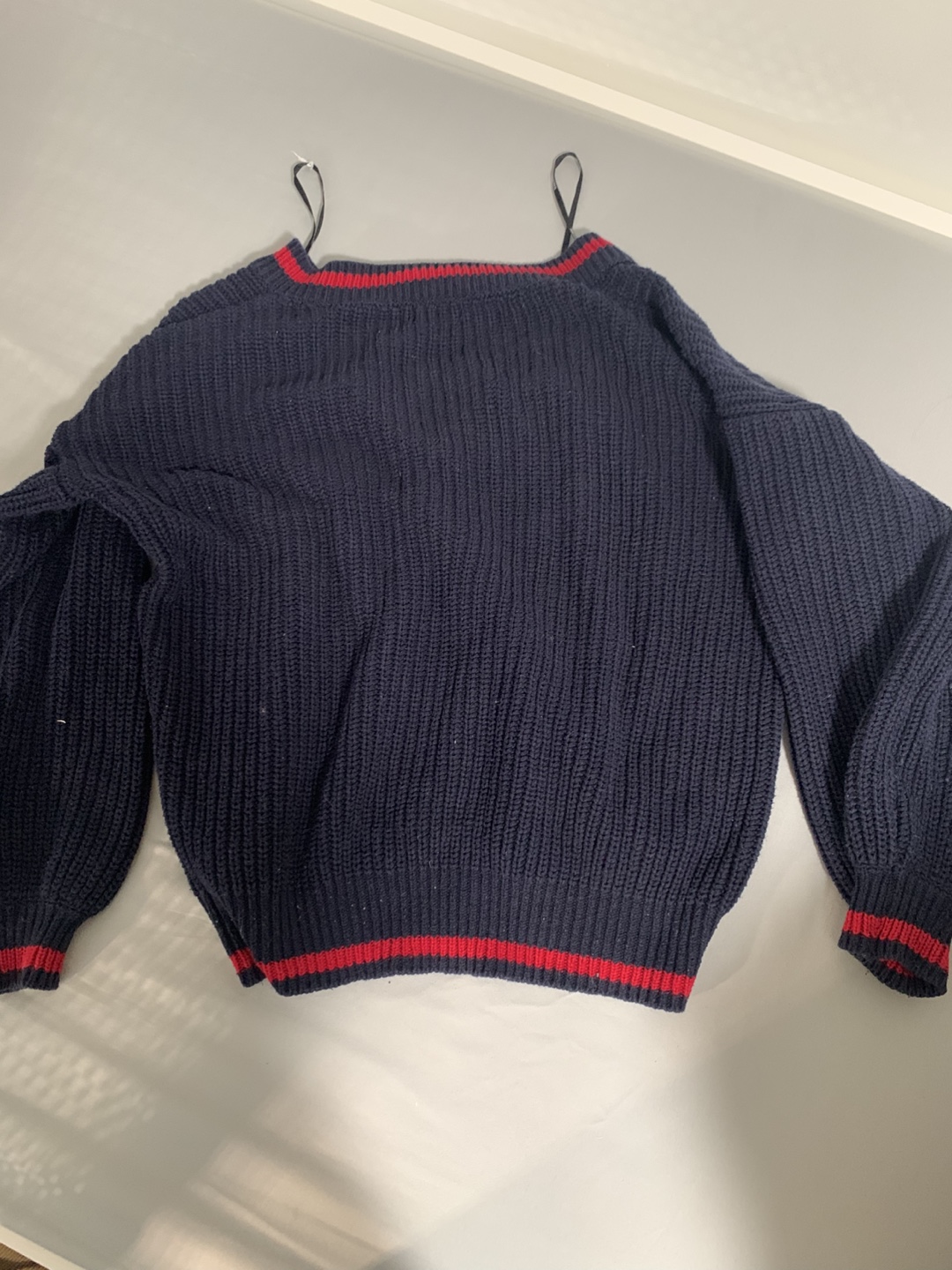 Navy blue V-neck sweater with red stripes - photo 2