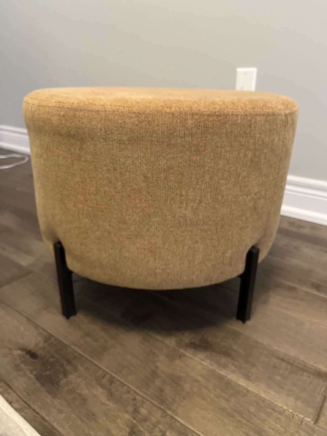 Round Upholstered Ottoman with Black Legs - photo 4