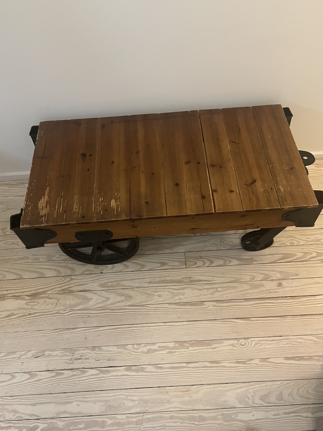 Industrial Style Wood and Metal Rolling Coffee Table