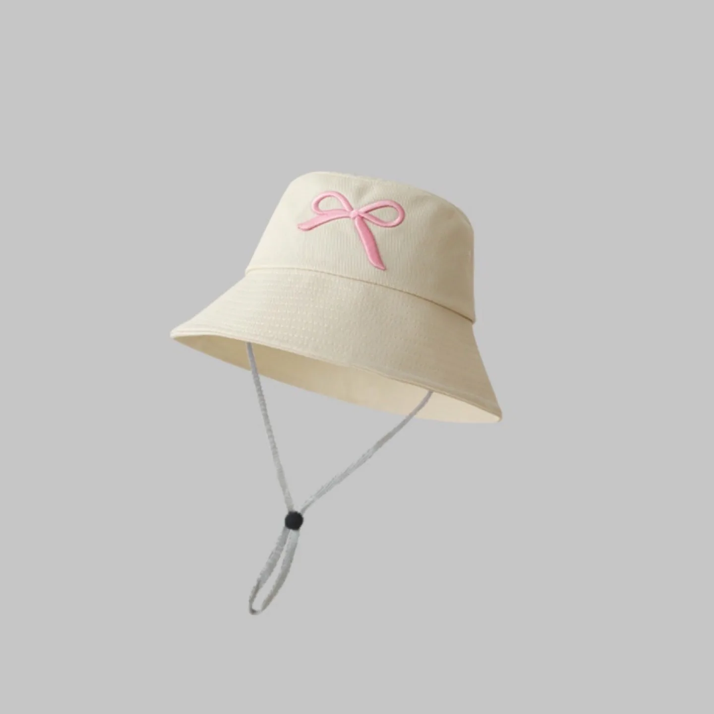 Adorable Beige Bucket Hat with Pink Bow thumbnail