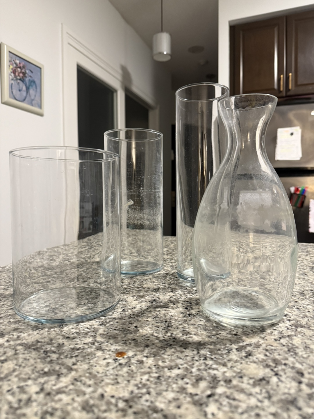 Set of four clear glass vases