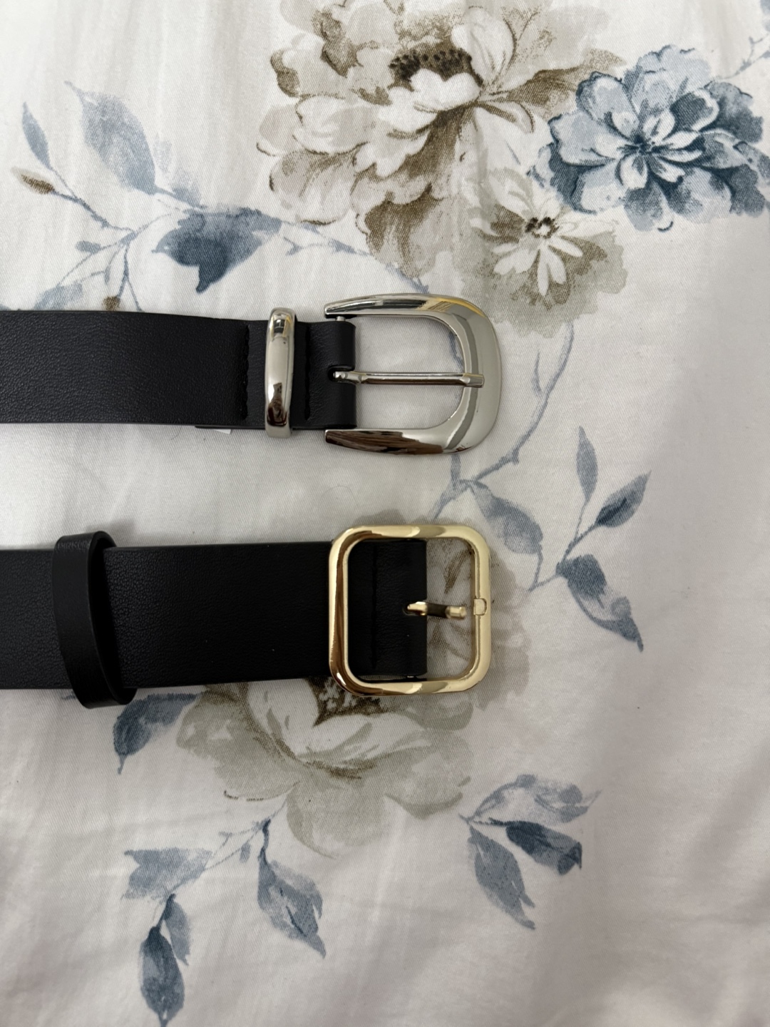 Two black leather belts