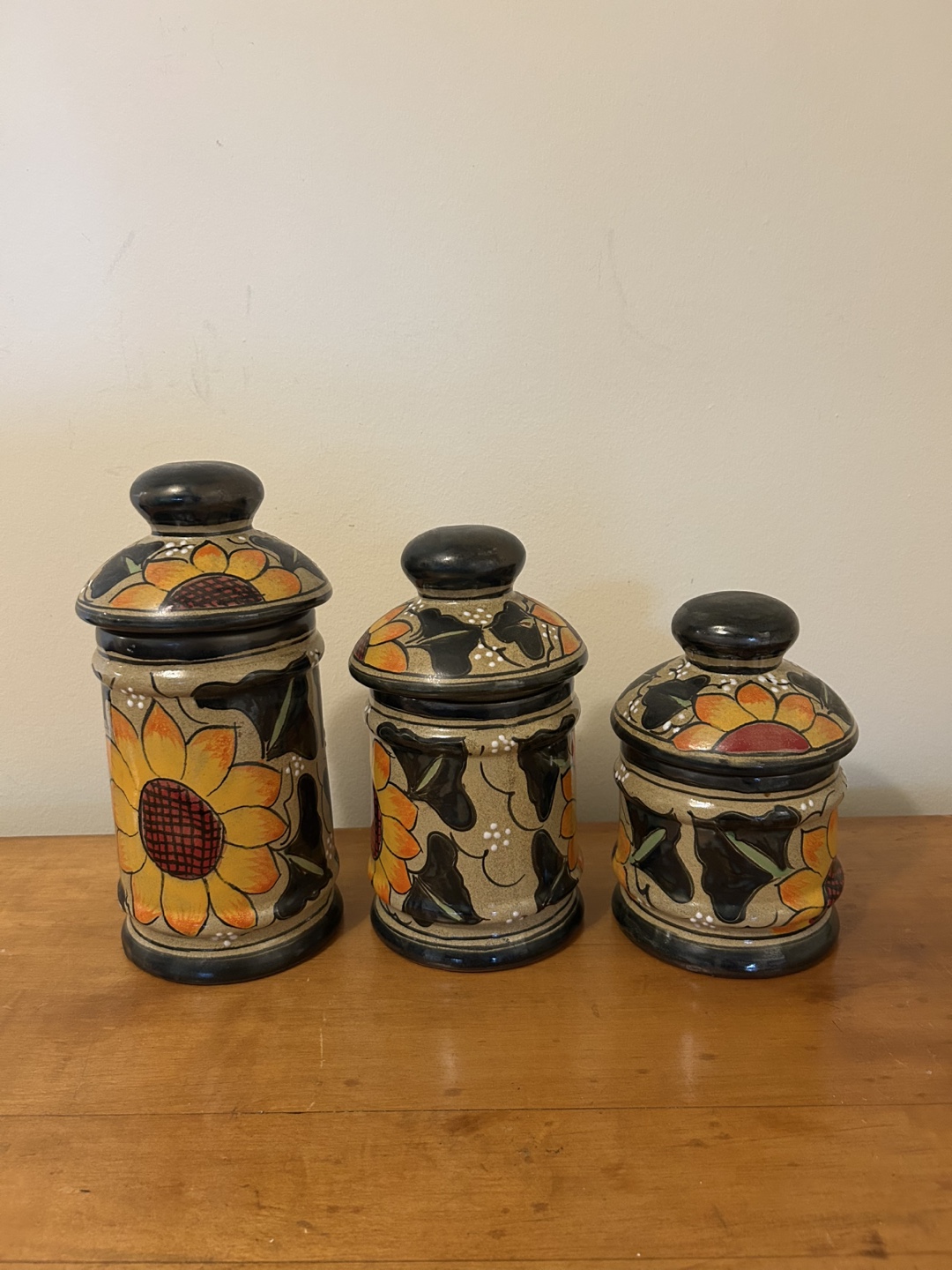 Set of three Talavera ceramic canisters with sunflower design