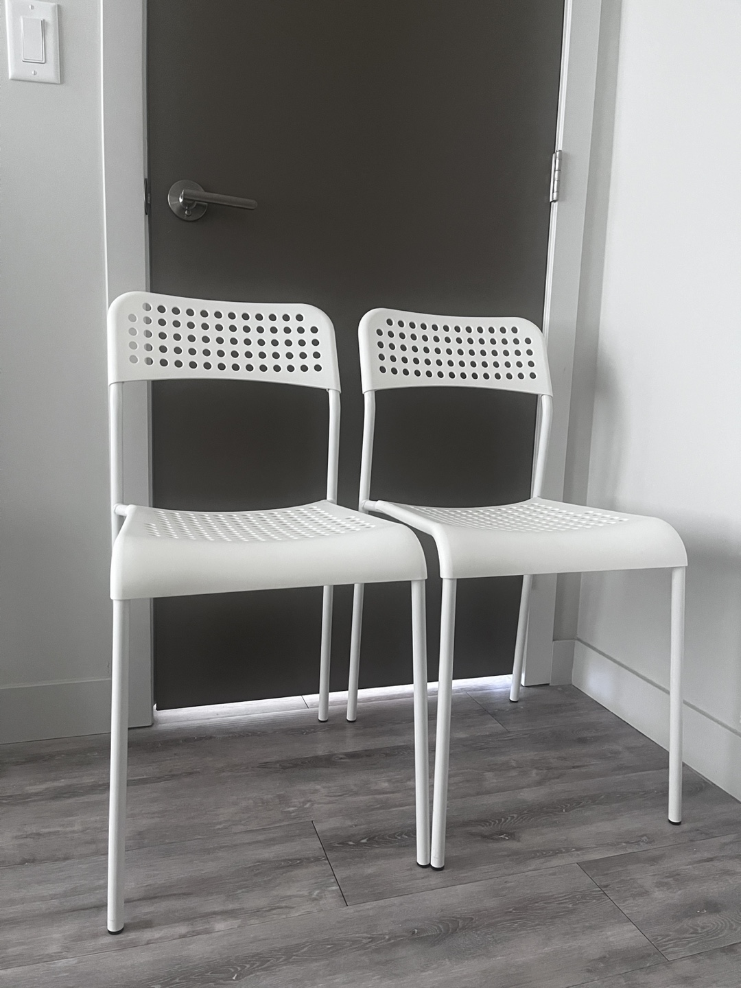 Pair of White Plastic Chairs