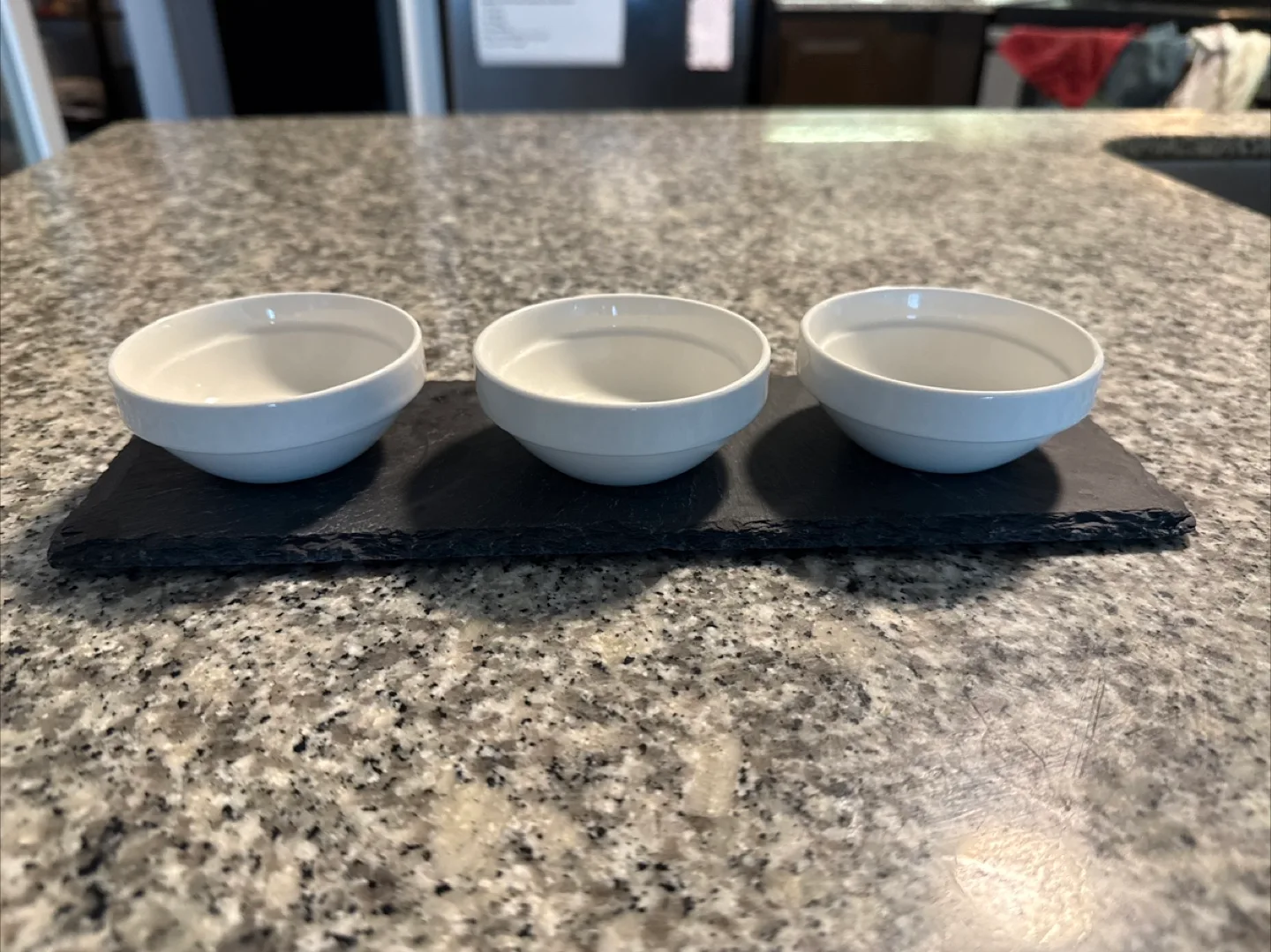 Three Small White Bowls on Slate Serving Tray thumbnail