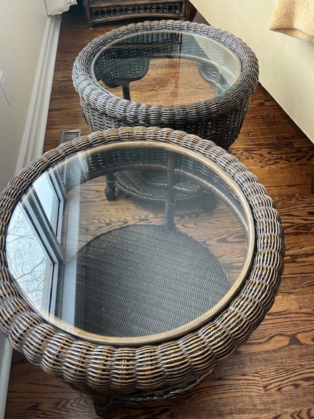 Pair of Round Rattan End Tables ($25 for both) with Glass Tops image indicator(2)