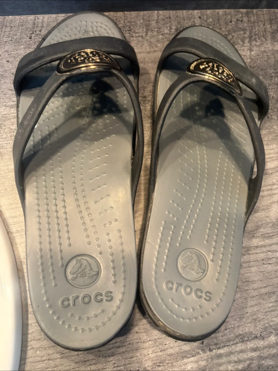 Crocs Black and Grey Wedge Sandals with Gold Detail image indicator(7)