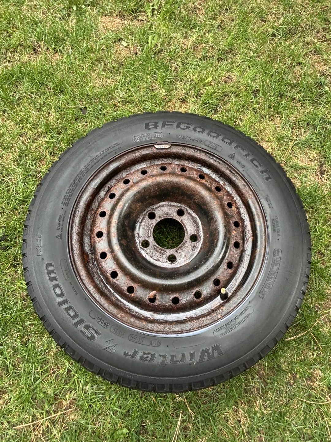 Three Used Goodyear Winter Tires on Steel Rims - photo 3
