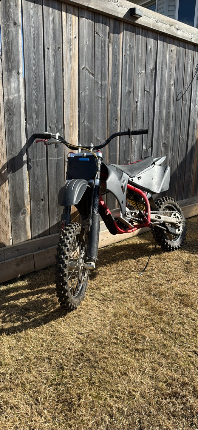 Electric Dirt Bike frame open to trades