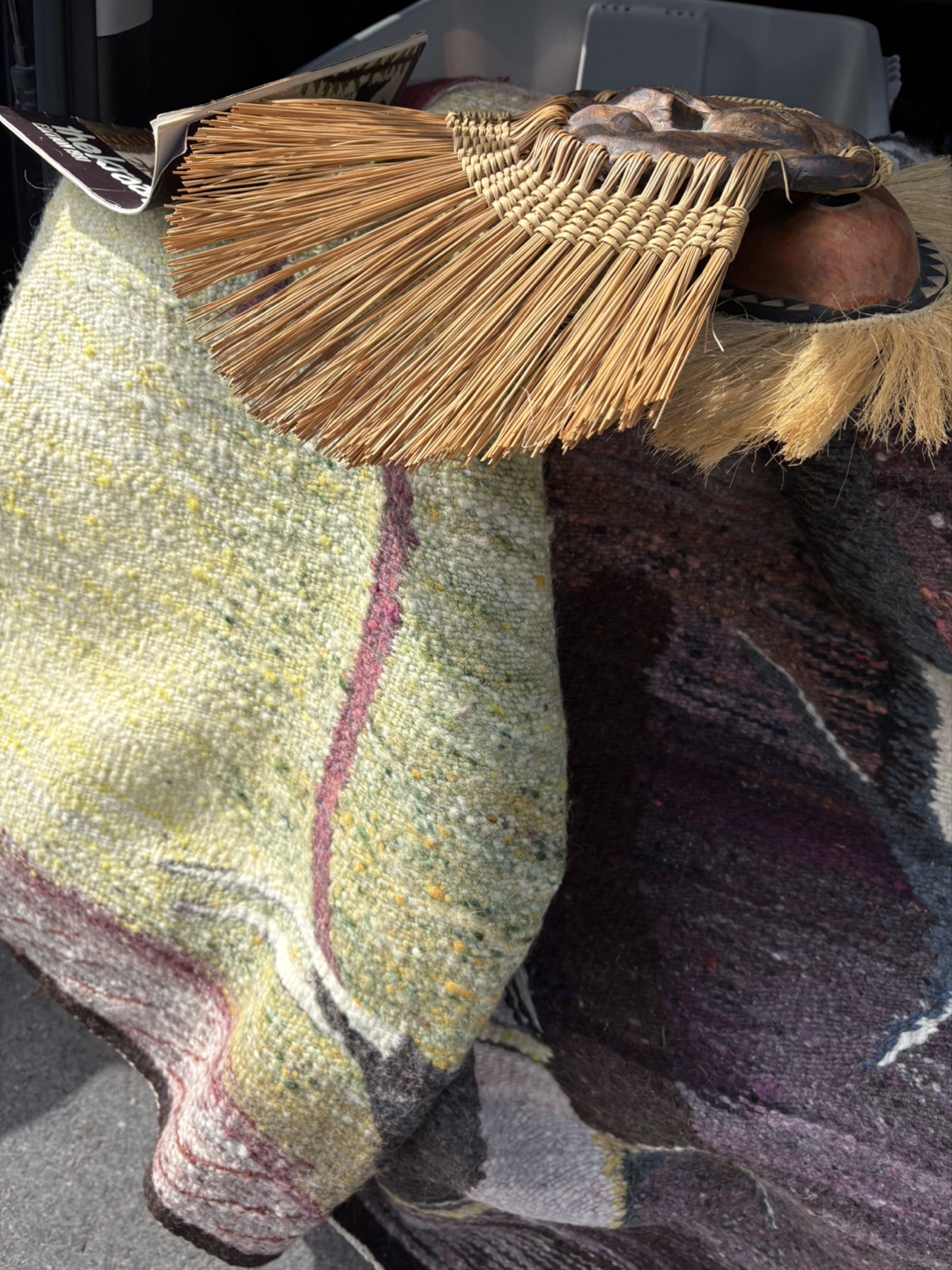 African tribal masks and handwoven rugs - photo 2