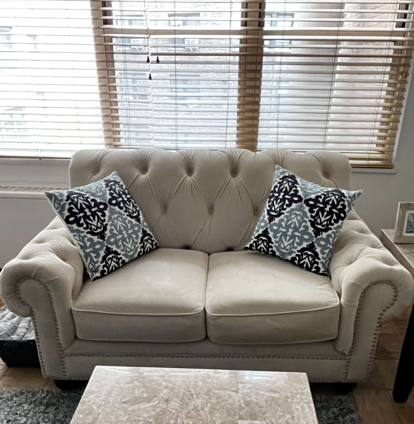 Beige Tufted Loveseat
