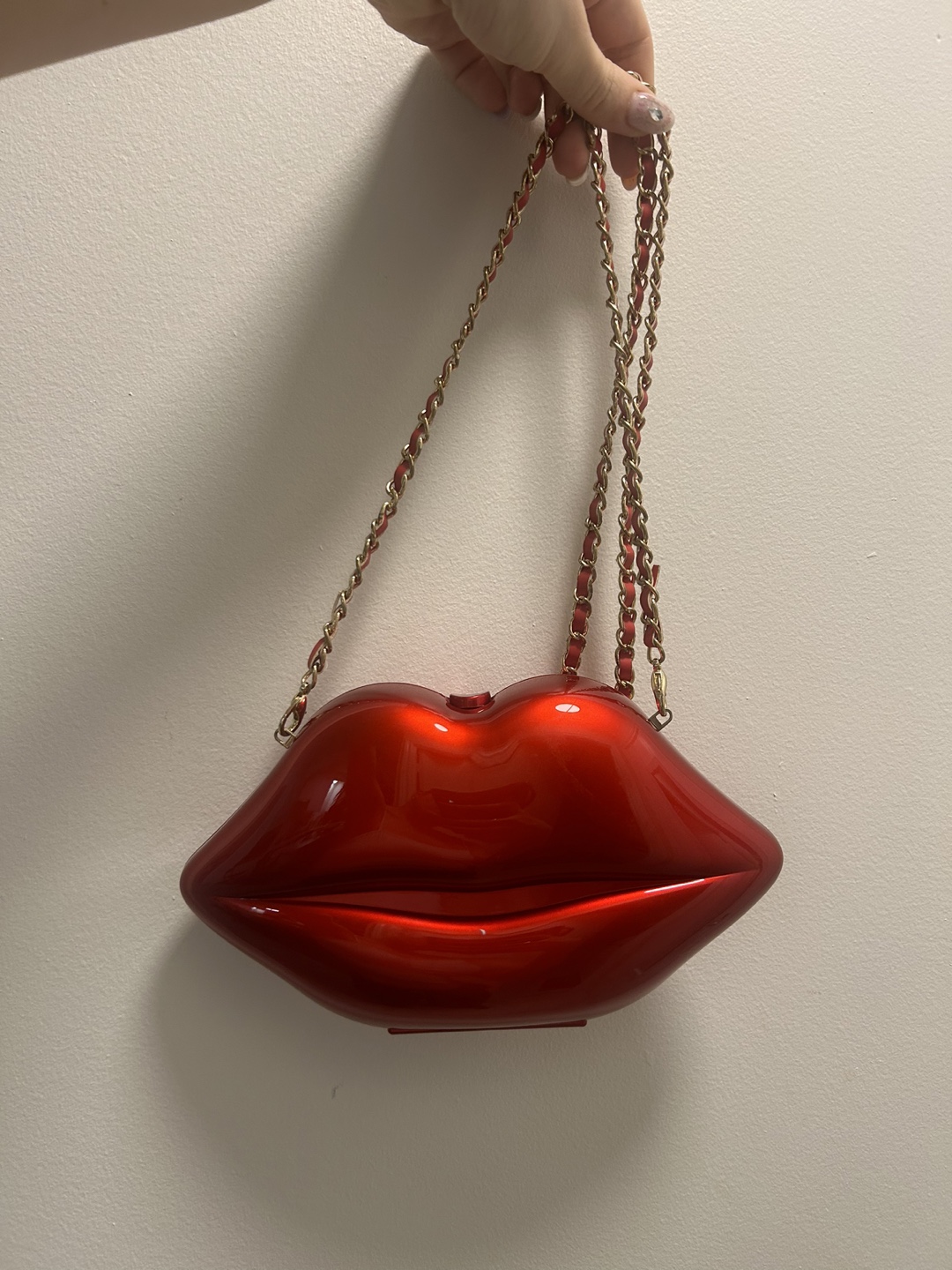 Red Lip-Shaped Clutch Bag with Gold Chain Strap